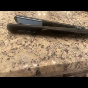 Bio ionic one pass hair straightener.